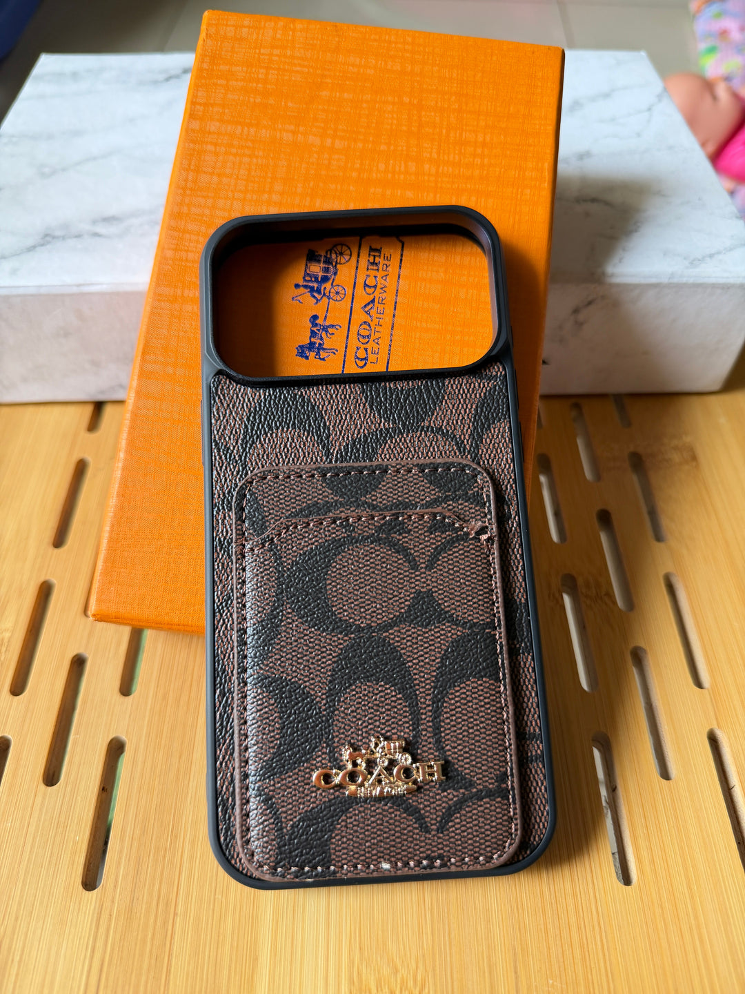 Coch famous brand iPhone cover