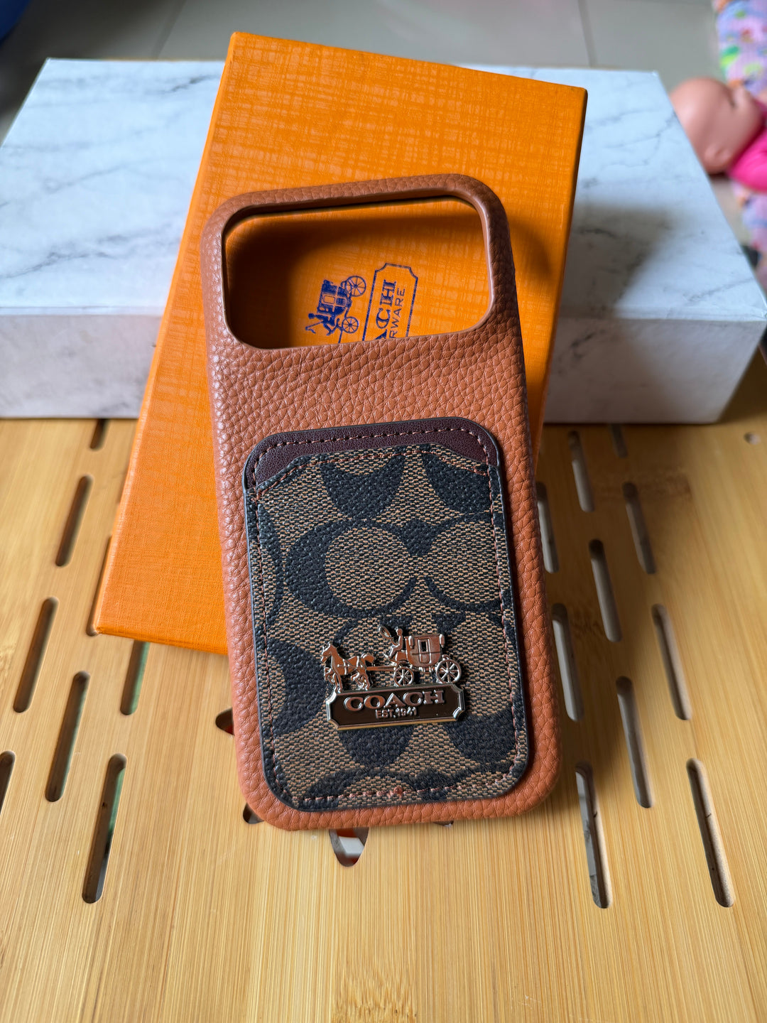 Coch famous brand iPhone cover
