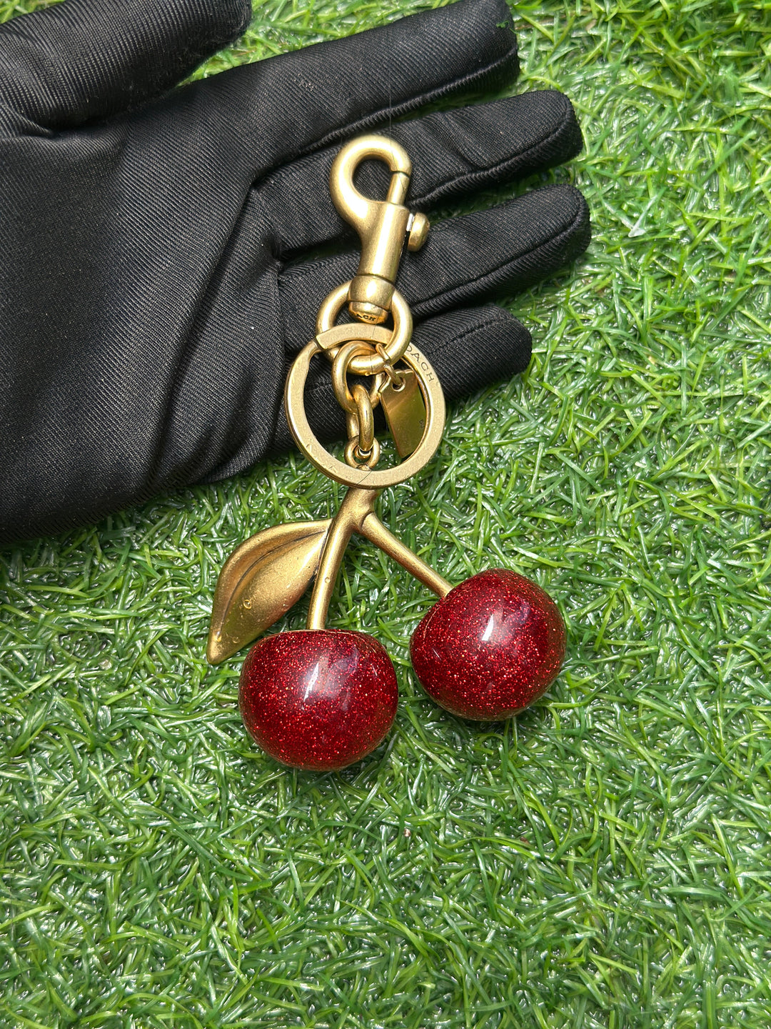 Coach cherry keychain